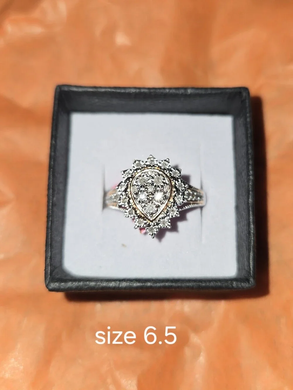 Sterling Silver And Rose Gold Pear Shaped Halo .20 CTW Natural Diamond Ring